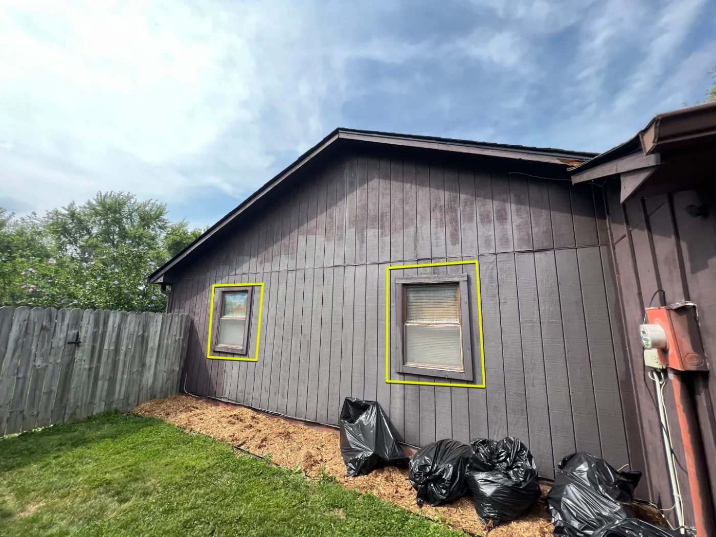 Storm-damaged window documented in Saddle Creek